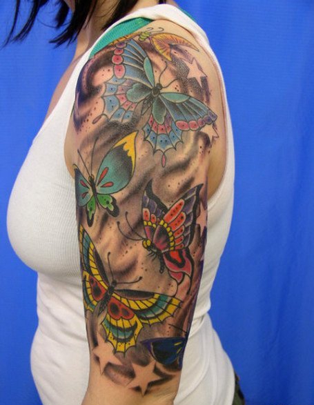 女生手臂上纹身点刺技巧植物纹身素材花朵纹身图片
