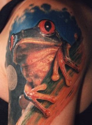 大臂美丽的青蛙纹身图片