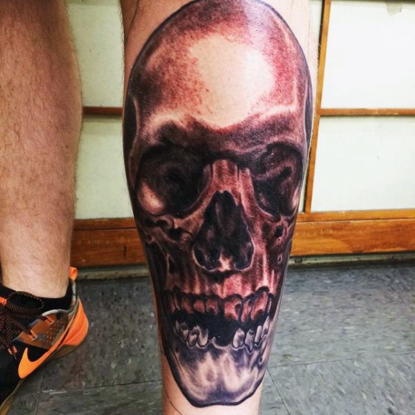 腿部棕色恐怖风格人类头骨纹身图片