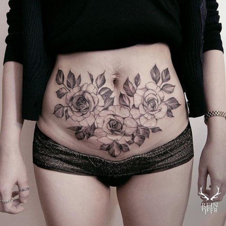 女性小腹私处的性感纹身图片