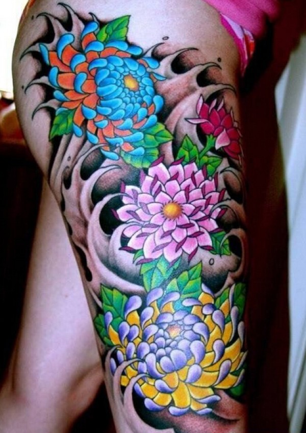 腿部彩色菊花文身作品