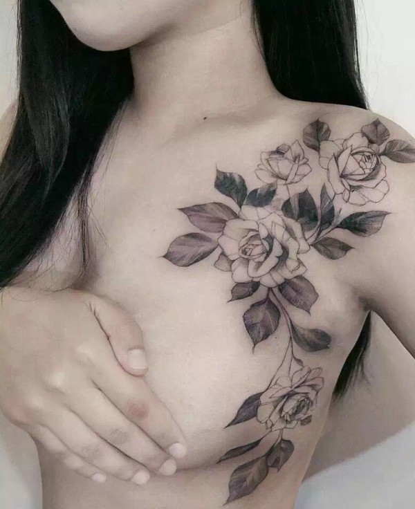 一组白肌下的墨花儿纹身图片