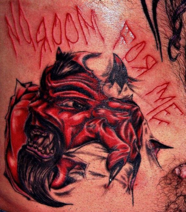血腥的红色恶魔皮肤撕裂纹身图片