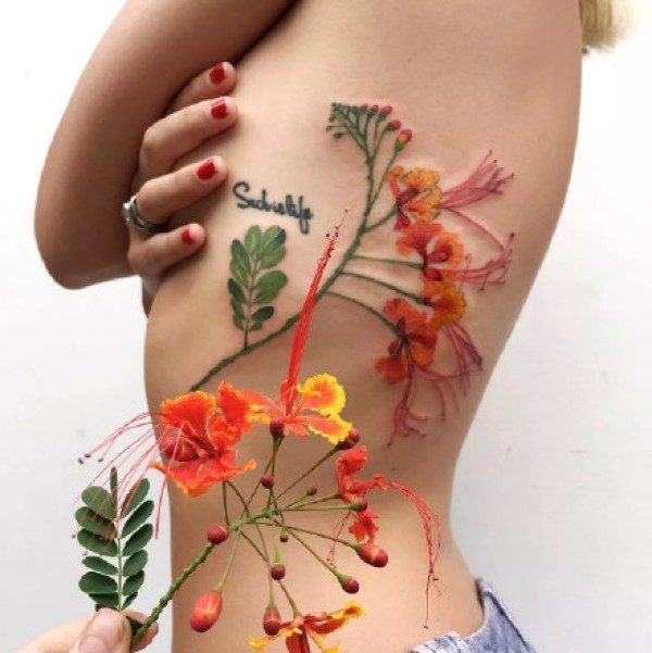 植物纹身图-一组把植物纹在身上的纹身图片作品
