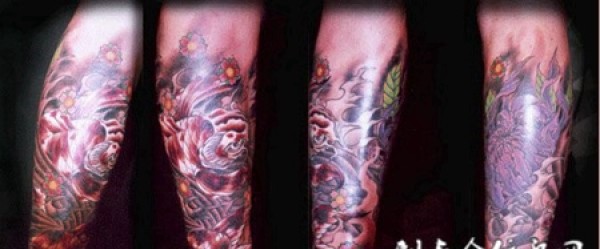 包小腿鲤鱼浪花纹身图片