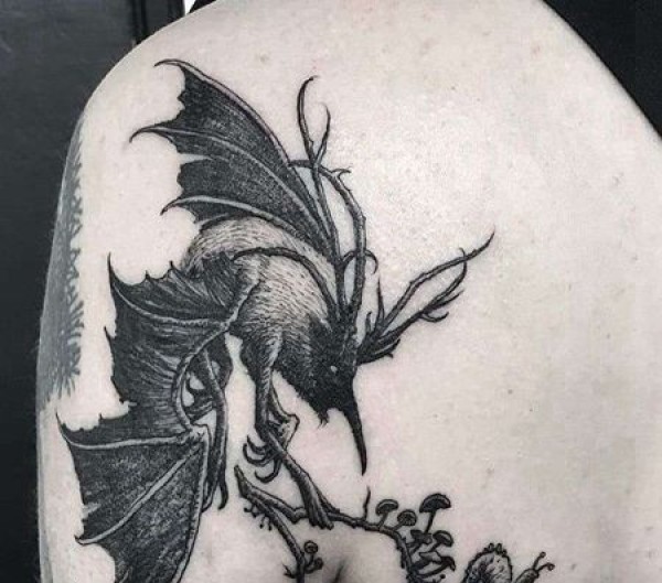 点线锁骨恶魔纹身图片