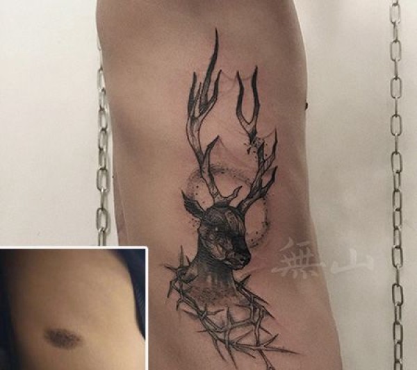 侧腰酷炫鹿角胎记遮盖纹身