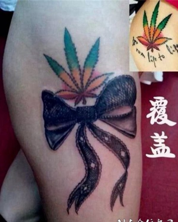 手臂蝴蝶结遮盖纹身图片