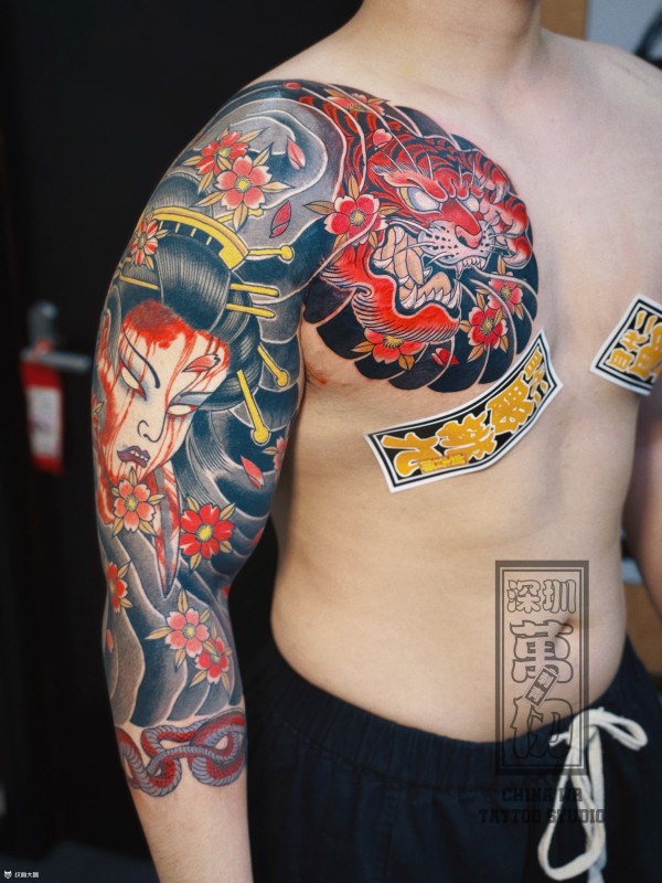 生首虎头半甲七分袖生首，虎头烛九阴